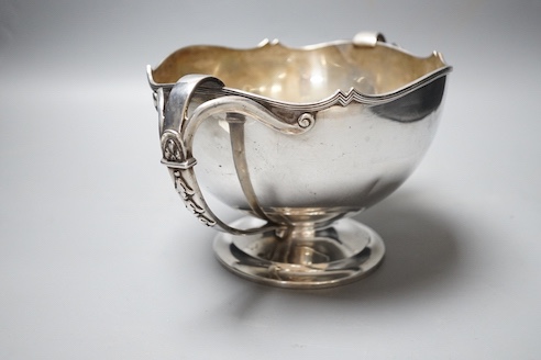 A George V silver two handled presentation pedestal bowl, with engraved inscription, Adie Bros. Birmingham, 1922, diameter 18.7cm, 29oz.
